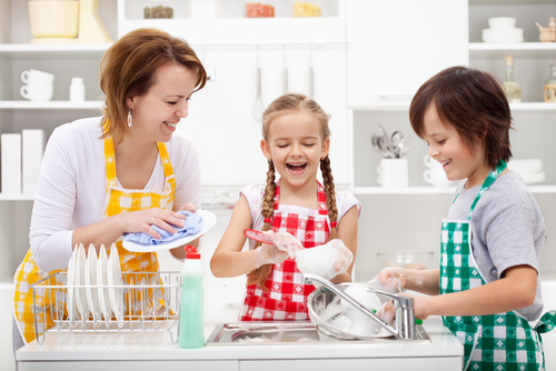 This is totally me and my two kids dressed in matching aprons and laughing as we wash perfectly clean dishes in a perfectly clean kitchen. What? You don't know.